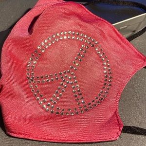 Pink face mask with Peace Symbol in crystal rhinestones.